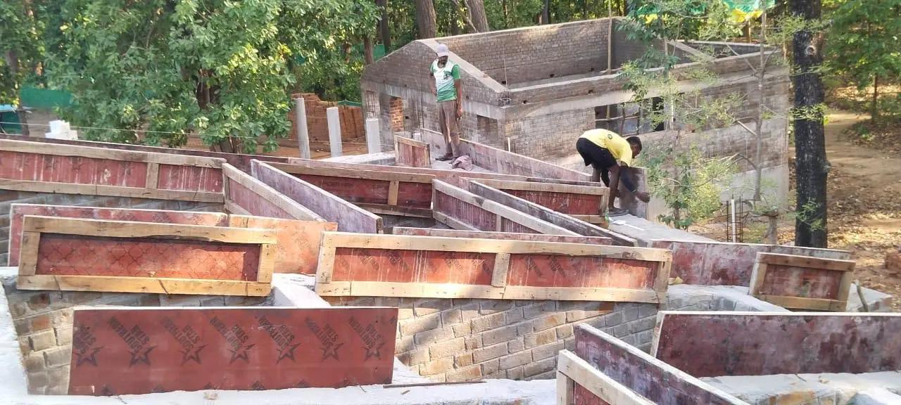 Wooden shuttering for the concrete roof band at Forest Rest House
